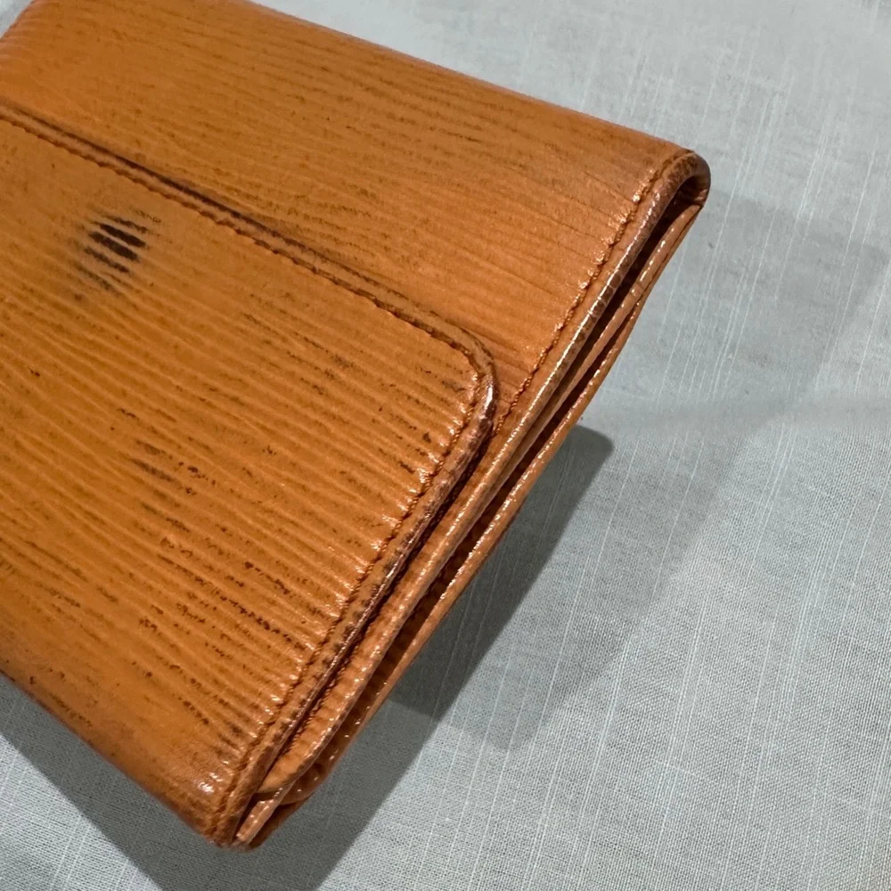 AUTHENTIC Louis Vuitton wallet. Tassel yellow.